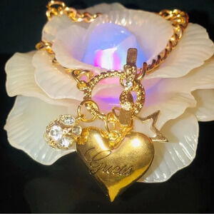 Guess gold charm bracelet